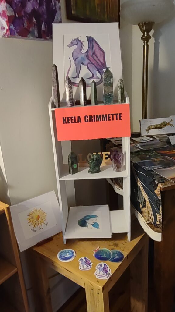 Keela Grimmette, carved crystal obelisk points, stone carved Figurines, Watercolor Matted Paintings.